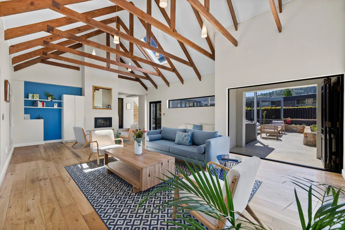 Vaulted living room opening onto the patio at Kronenzicht Nature Villa