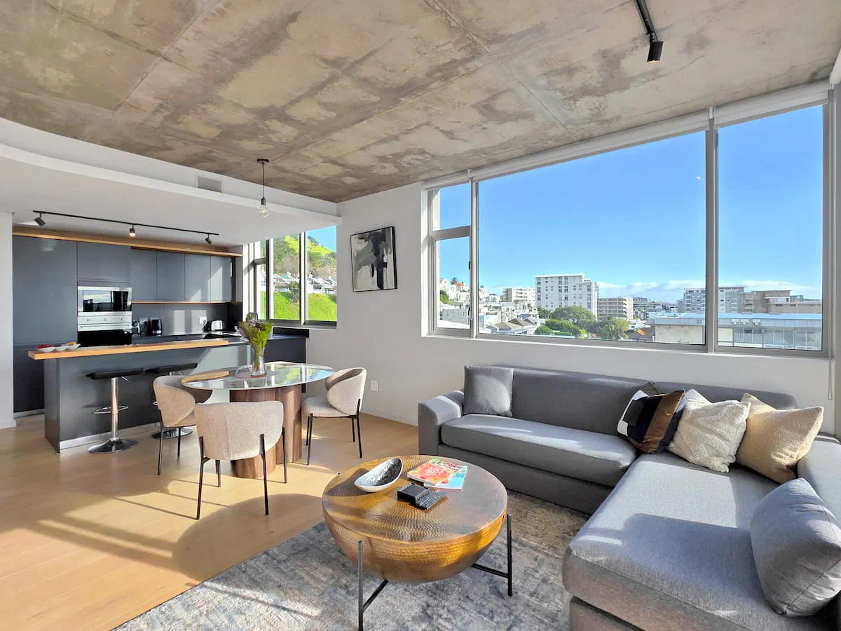 Open-plan living room with city views at The Quarter